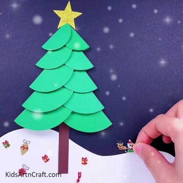 Add gifts and Santa stickers- Splendid Christmas Tree Paper Creations For Little Ones