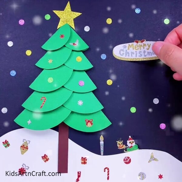 Add tree decorations and a merry Christmas sticker-Delightful Christmas Tree Paper Projects For Youngsters