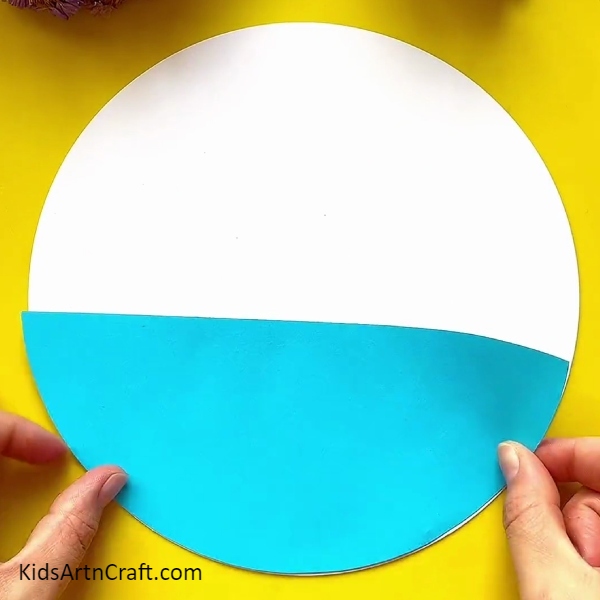Pasting A Blue Semicircle- Learn to make a gorgeous flower vase art project step-by-step 