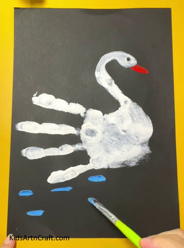 Painting the lake.- Splendid Handprint Swan Project For First-Timers