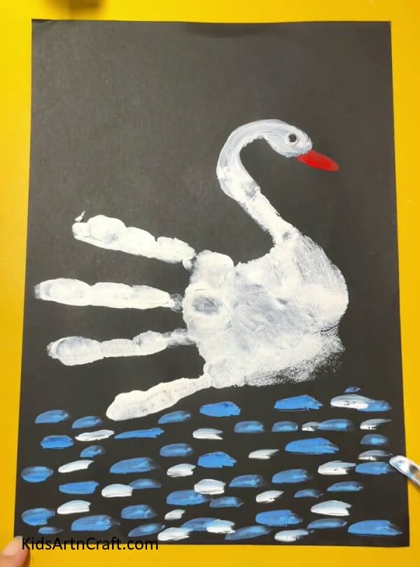Painting the entire lake.- Superb Handprint Swan Instruction Guide For Inexperienced