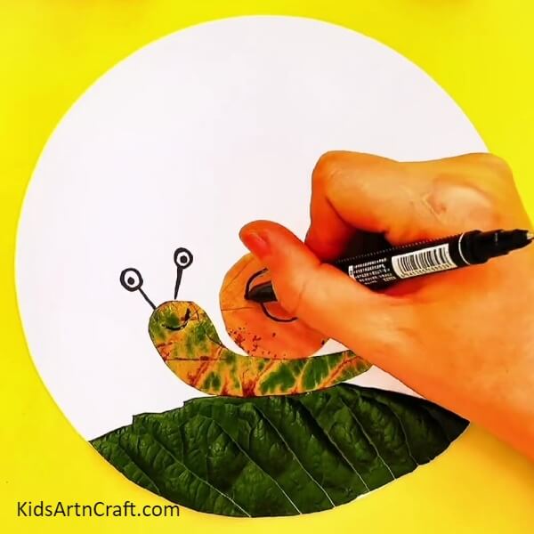 Draw The Shell Of The Snail With A Black Marker-A Tutorial for Creating a Lovely Leaf Snail for Beginners