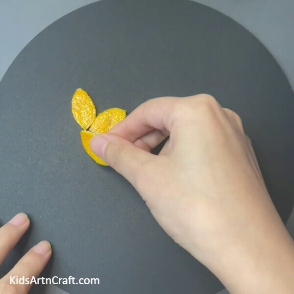 Pasting The Peels-Forming a Charming Orange Peel Flower Garden with the Children 