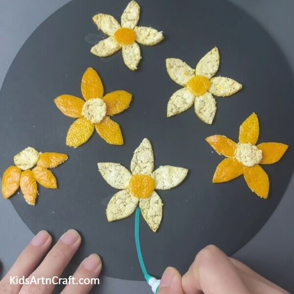 Drawing A Stem-Building a lovely Orange Peel Flower Garden with your Little Ones