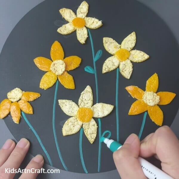 Drawing More Stems And Leaves-Constructing a colorful Orange Peel Blossom Garden with Kids 