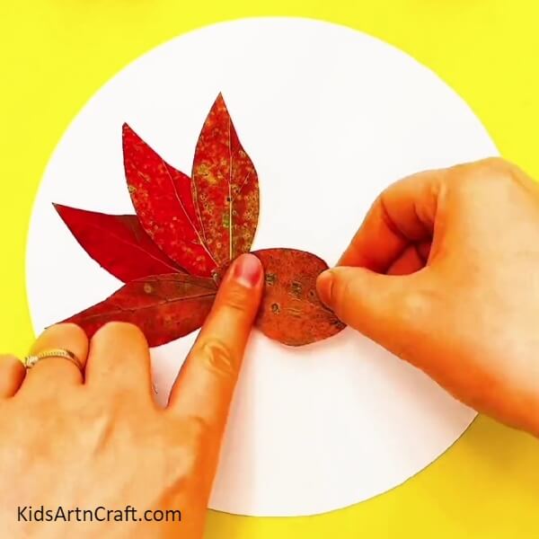 Stick A Small Red Leaf Behind The Three Leaves-Designing Red Fish Swimming In Water Craft