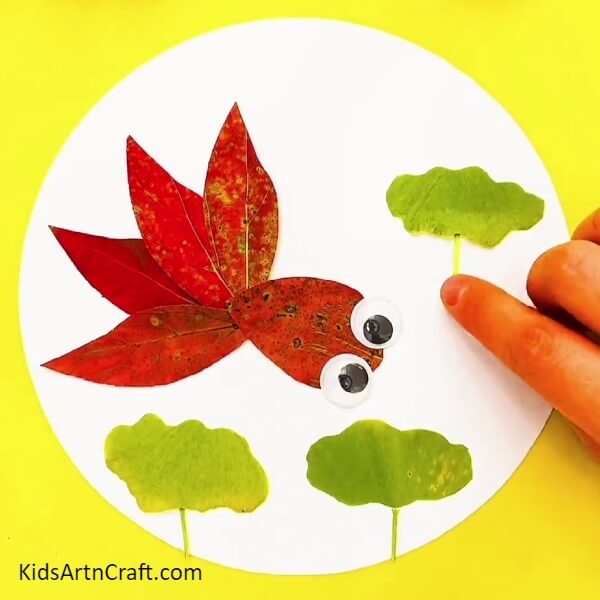 Stick More Such Green Leaves And Draw Its Stem-Simple Design of Red Fish Swimming In Water Craft