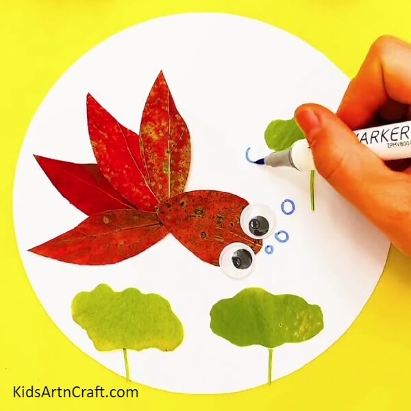 Make Tiny Bubbles On The Sides Of Leaves With A Blue Sketch Pen-Red Fish Swimming Easy Craft For Kids