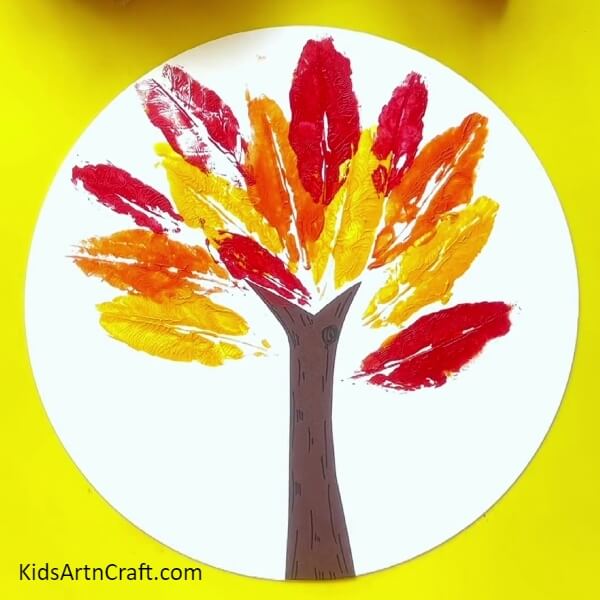 Making More Colored Leaf Impressions-Tutorial to make a pretty tree painting with leaf impressions, for kids