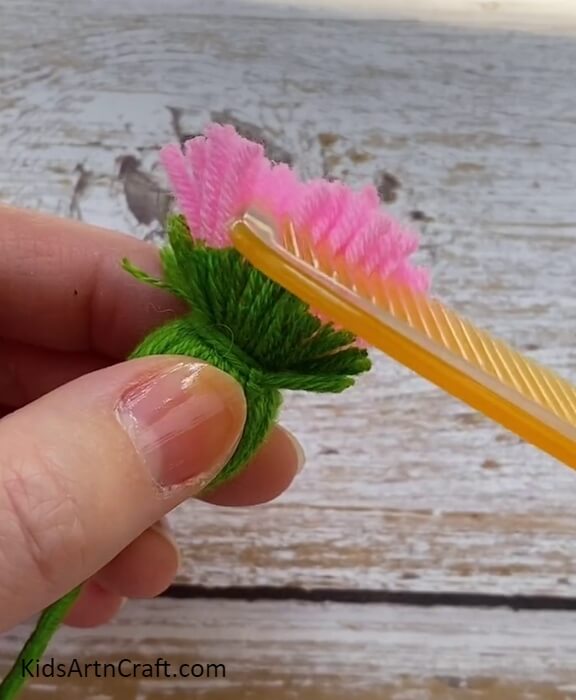 Combing Our Flower Petals Using Comb- A Lovely Guide For Crafting Wool Flowers Step-by-Step For Kids 