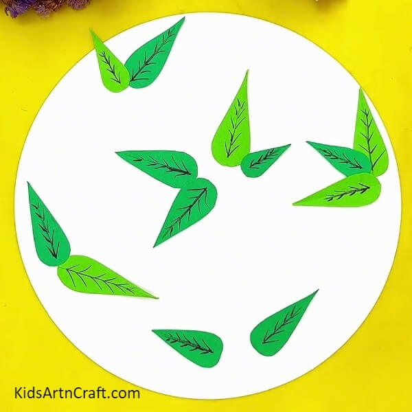 Stick Green Leaves On White Craft Paper With Glue Beginner's Guide to Making Blueberry Clay Art for kids