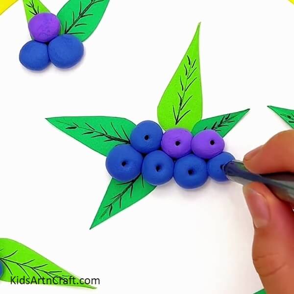 Make Holes In The Blue Balls With Black Marker/sketch pen for Crafting Blueberry Clay for Beginners-