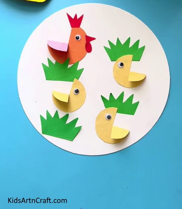 Pasting The Googly Eyes - An effortless Easter decoration project using chicken motifs.