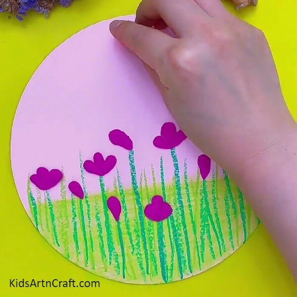 Creating A Sun With The Use Of Red Color Clay- Step-by-step guide to create flowery landscape with clay for kids