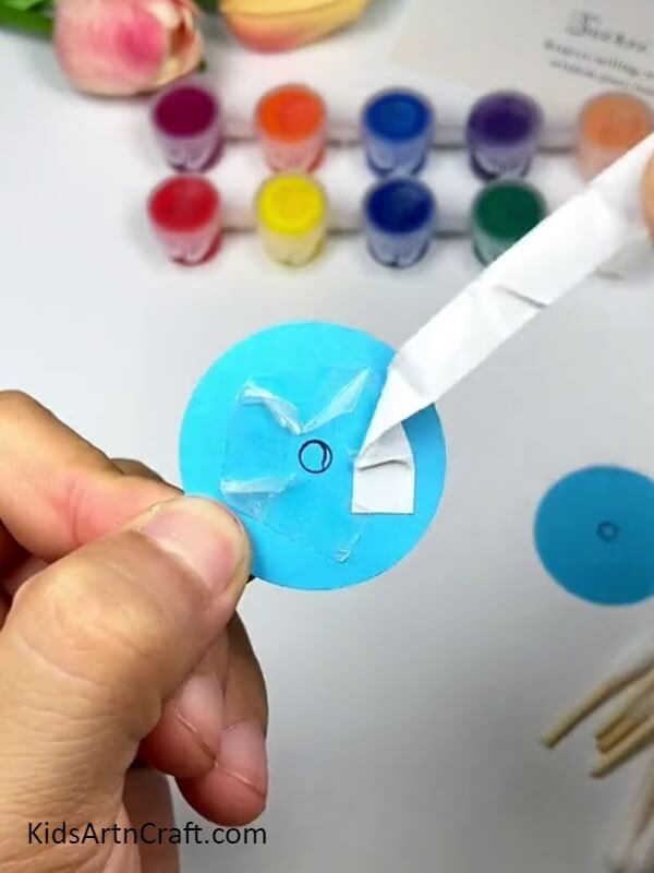 Applying Double Sided Tape On Circle - DIY Instructions for Crafting a Colorful Cotton Earbud Windmill for Beginners 