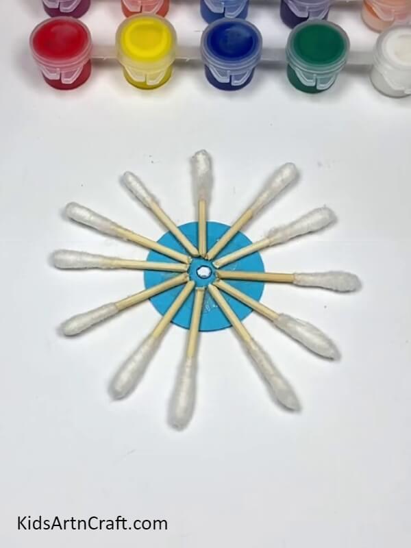 Completing Pasting The Earbuds - Learn How to Create a Colorful Cotton Earbud Windmill with This Tutorial 