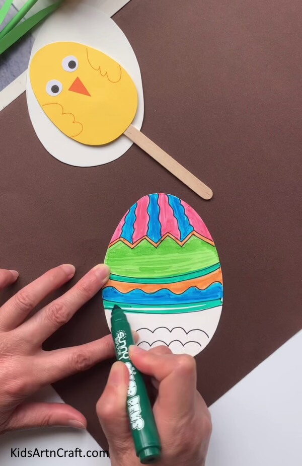Completing Decorating The Egg A tutorial for making Easter Eggs with kids in an easy way.