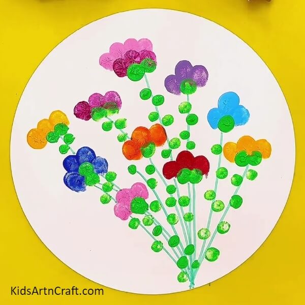 Your colourful painting of flower printing is finally ready- An Easy-to-Follow Tutorial to Teach Kids How to Create Flower Fingerprint Paintings 