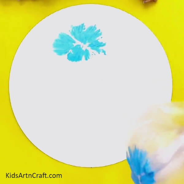 First Stamped Flower-Vibrant Flowered Crafts For Kids Using Plastic Bags 