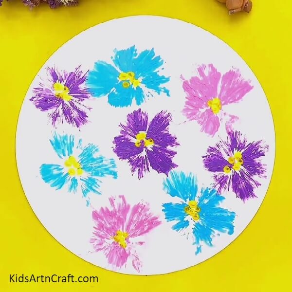 Painting With The Earbuds-Polythene craft idea to make vivid flowers for kids