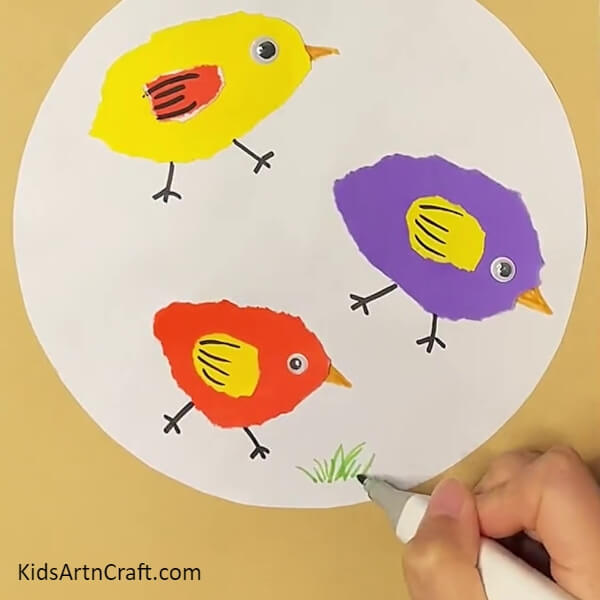 Detailing The Wings And Making Grass - Instructions For Crafting Colorful Paper Chicks With Children Step-by-step
