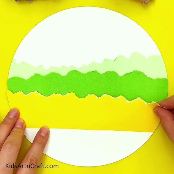 Making A Yellow Layer-Get the kids crafting with this colorful tree landscape idea