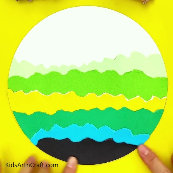 Making A Green And Blue Layer-An artistic craft activity for kids: a colorful tree landscape