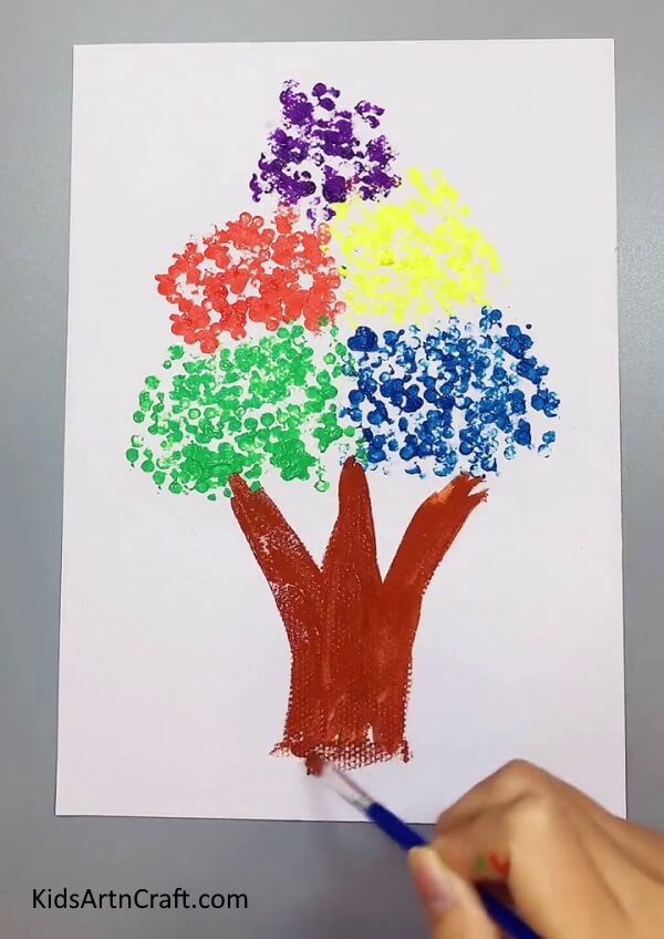Making Trunk Of Tree - A creative project to make a tree painting with earbuds and paint.