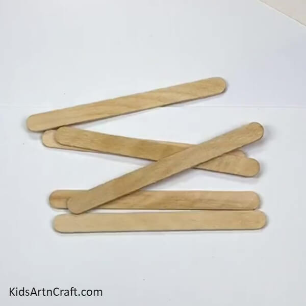 Take 5-6 Popsicle Sticks-Step-by-step Tutorial For Kids To Make A Neat Airplane Craft Out Of Popsicle Sticks 