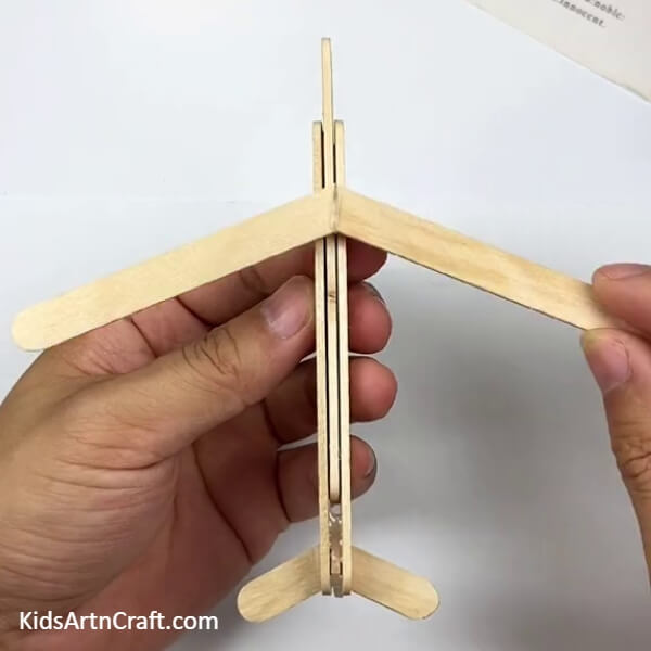Take-Two More Sticks To Make The Wings Of The Airplane-Learn How To Craft An Airplane Model From Popsicle Sticks With This Step-by-step Tutorial For Kids 