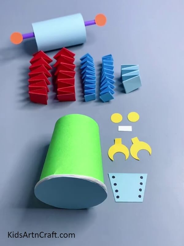 Cutting Out The Other Organs. step-by-step tutorial of Cool Robot Craft Using Paper Cup &amp; Toilet Paper Roll for kids