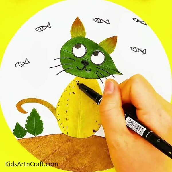 Highlight Cat’s Body- A Kid-Friendly Guide to Crafting a Cat Drawing with Leaves from Fall