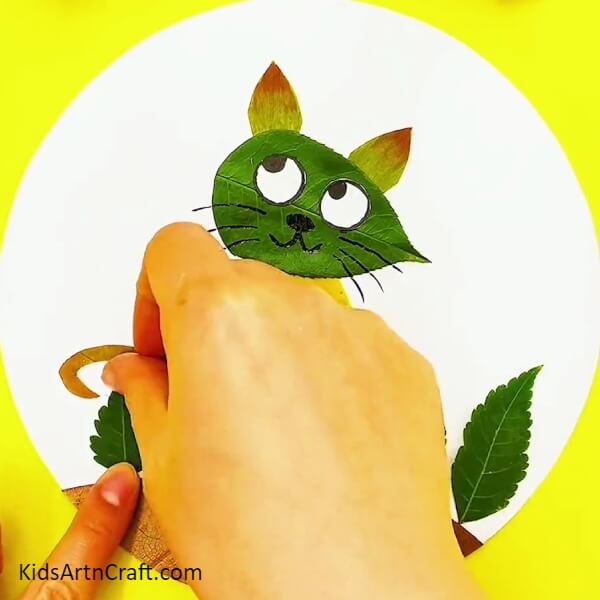 Add Details on the Left Side- Teaching Kids to Draw a Cat with Leaves from Autumn