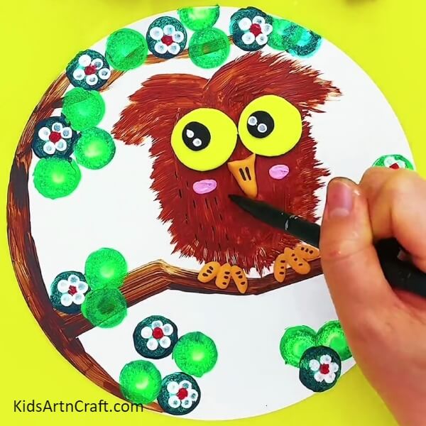 Making Black marks-Creative Owl Painting Instructions for Kids