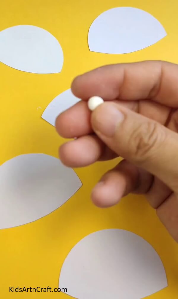 Making tiny balls using clay- An Adorable Frame of Emotion Made by You - An Illustrated Guide