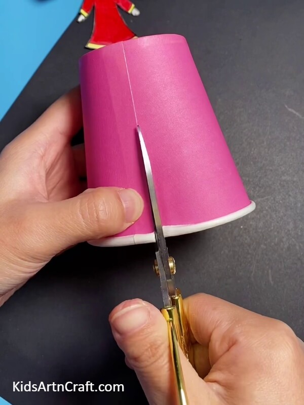 Take A Pink Or Any Color, Paper Cup And Cut It In The Manner Shown