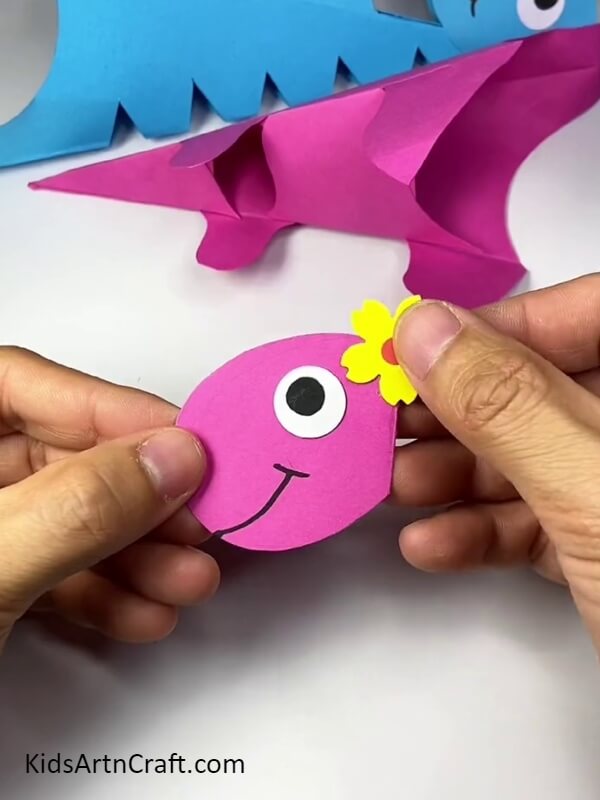 Pasting A Flower. cute little dinosaur for kids