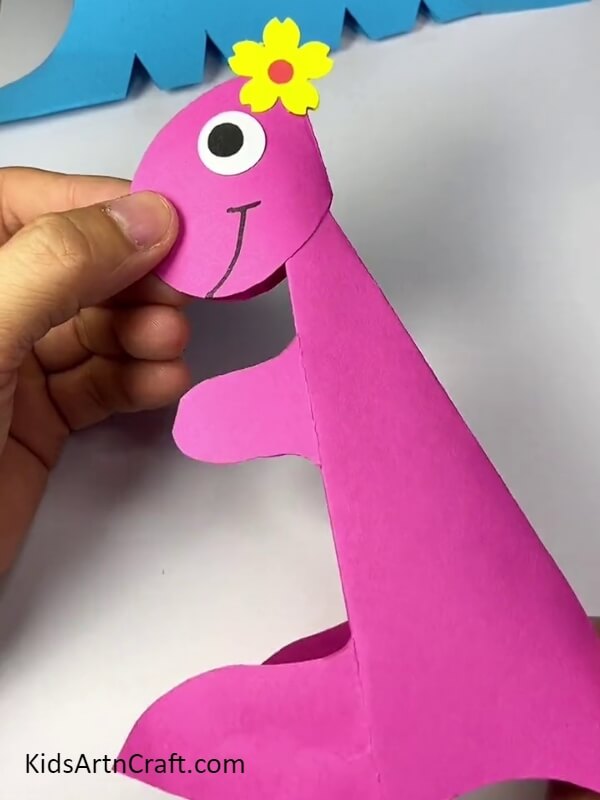 Sticking The Face On The Body. Cute Paper Dinosaur Craft Tutorial for Beginners