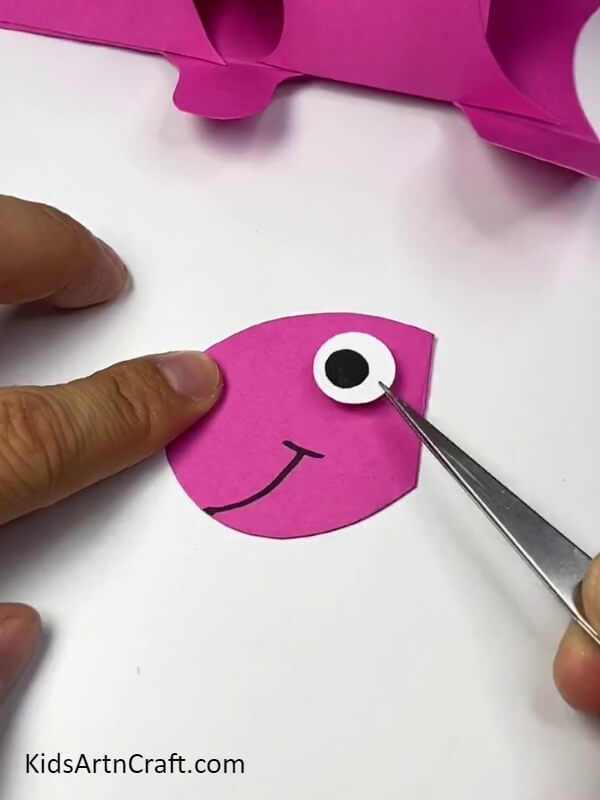 Pasting The Eye. tutorial to make cute dinosaur craft for children
