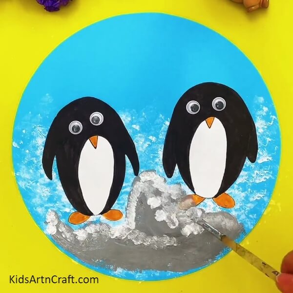Painting The Entire Bottom Section-Precious Penguins Paper Art Instructional Guide for Kids