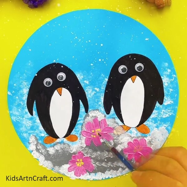 Painting Three Flowers On The Sheet-Guidance for Crafting Cute Penguin Paper Crafts with Kids 