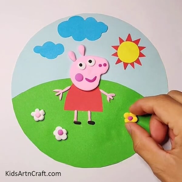 Add flowers made of dough and tail too-Endearing Peppa Pig Scene Crafting for kids