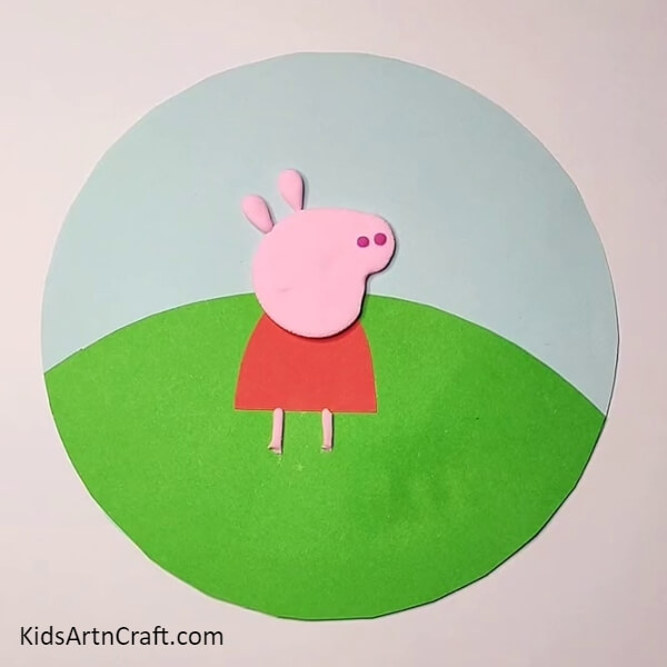 Add details such as eyes and nose- Step-by-step guide to craft an cute peppa pig scenery for Kids
