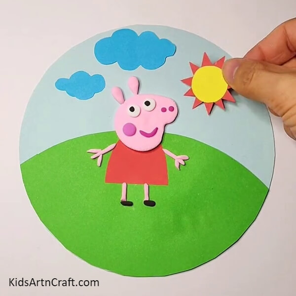 Paste the sun cutout-Pretty Peppa Pig Scene Activity for children