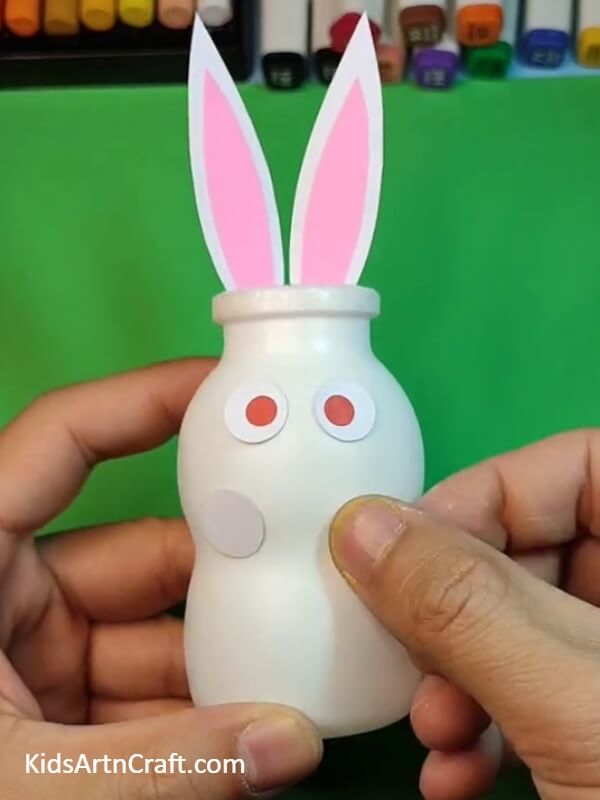Pasting the forelimbs-Appealing Rabbit styled Pen Pot for Preschoolers
