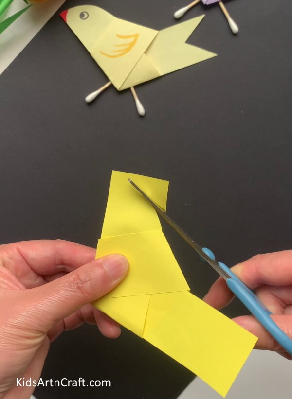 Cutting Paper - Create a bird-inspired artwork with paper and earphones.