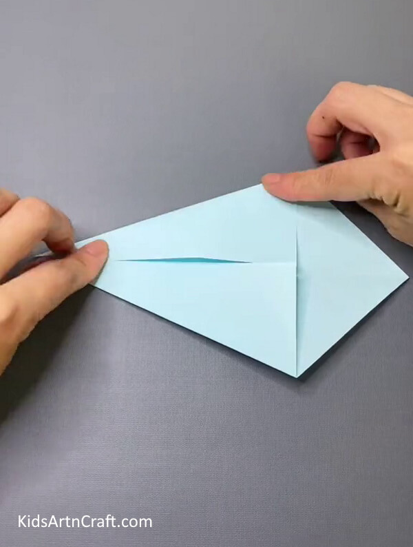 Forming A Kite Shape-Making a bird-themed finger puppet for youngsters