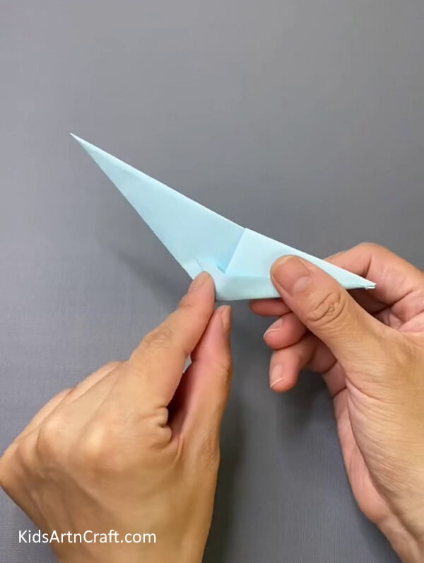 Folding The Extra-Part-Put together a bird puppet that can be worn on the finger