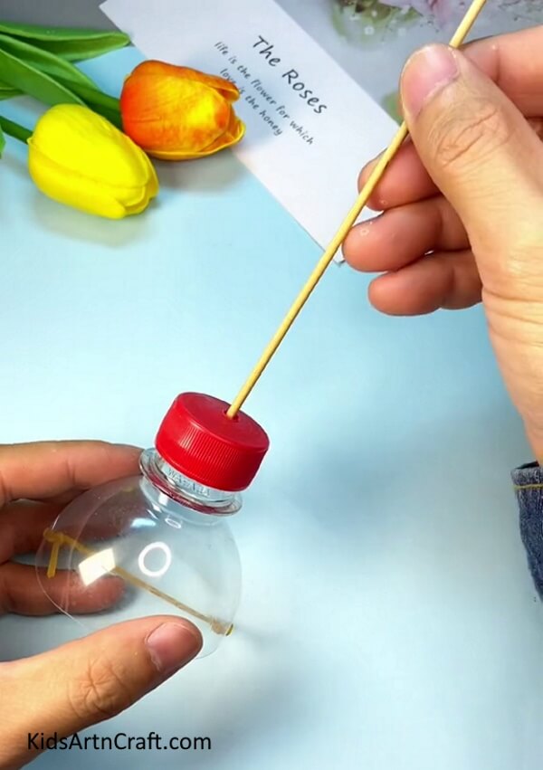 Inserting The Arrow In The Bottle- Home-made Bottle and Stick Launcher for Little Ones