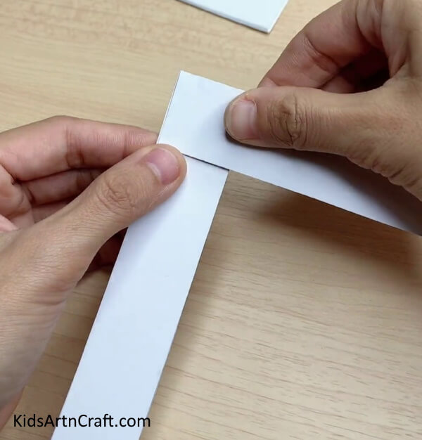 Pasting Two Strips Together - Kids Can Easily Make a Bouncy Paper Rabbit Craft At Home